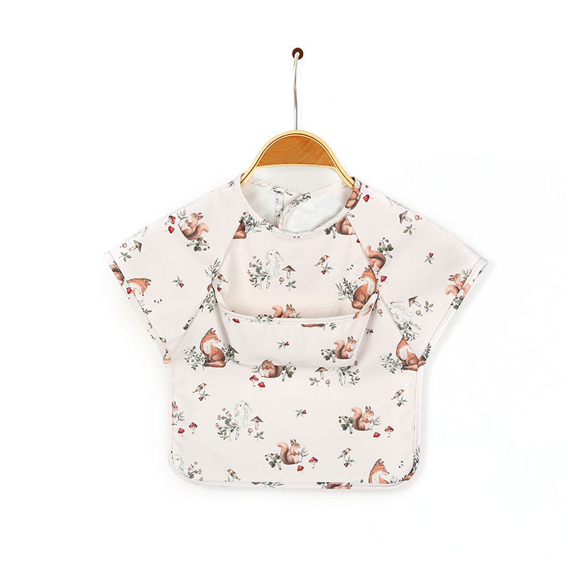 Bavoir tablier en PU à manches courtes et design de poche pour bébé